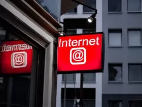 Internet LED signage beside building near buildings