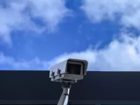 white security camera at daytime