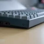 black computer keyboard on brown wooden table
