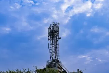 8 Benefits of Cell Signal Boosters: Enhance Your Connectivity 114 a tower with a cell phone on top of it