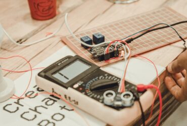 person uses white multimeter